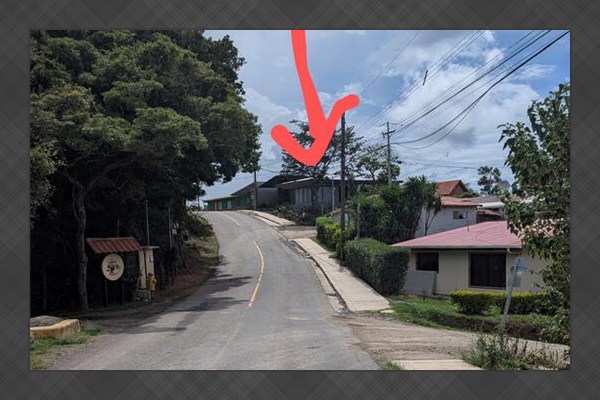 You will see this view as you follow Google or Waze directions to "Casiitas La Esquina". True to it's name, it is the house on the corner. Google says "you destination is on the left, but it is on the right as shown by the big red arrow in the pic.