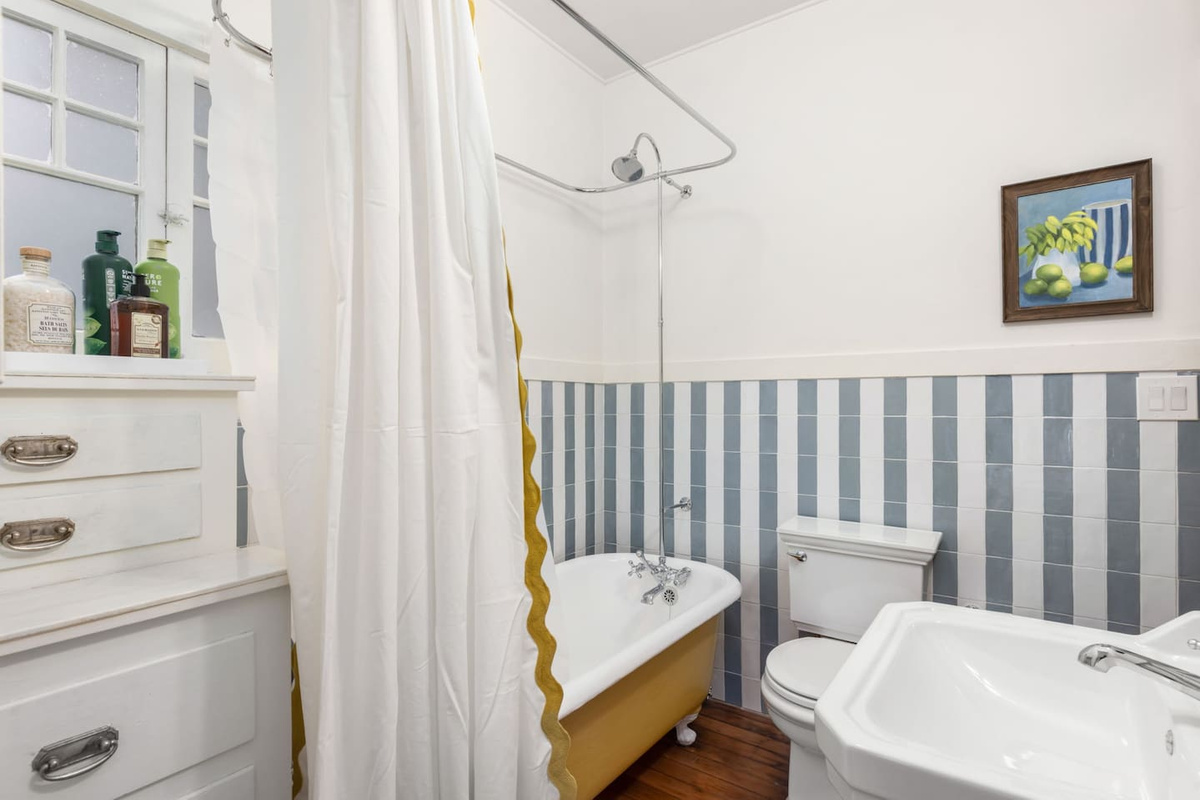 restored original clawfoot tub, new fixtures