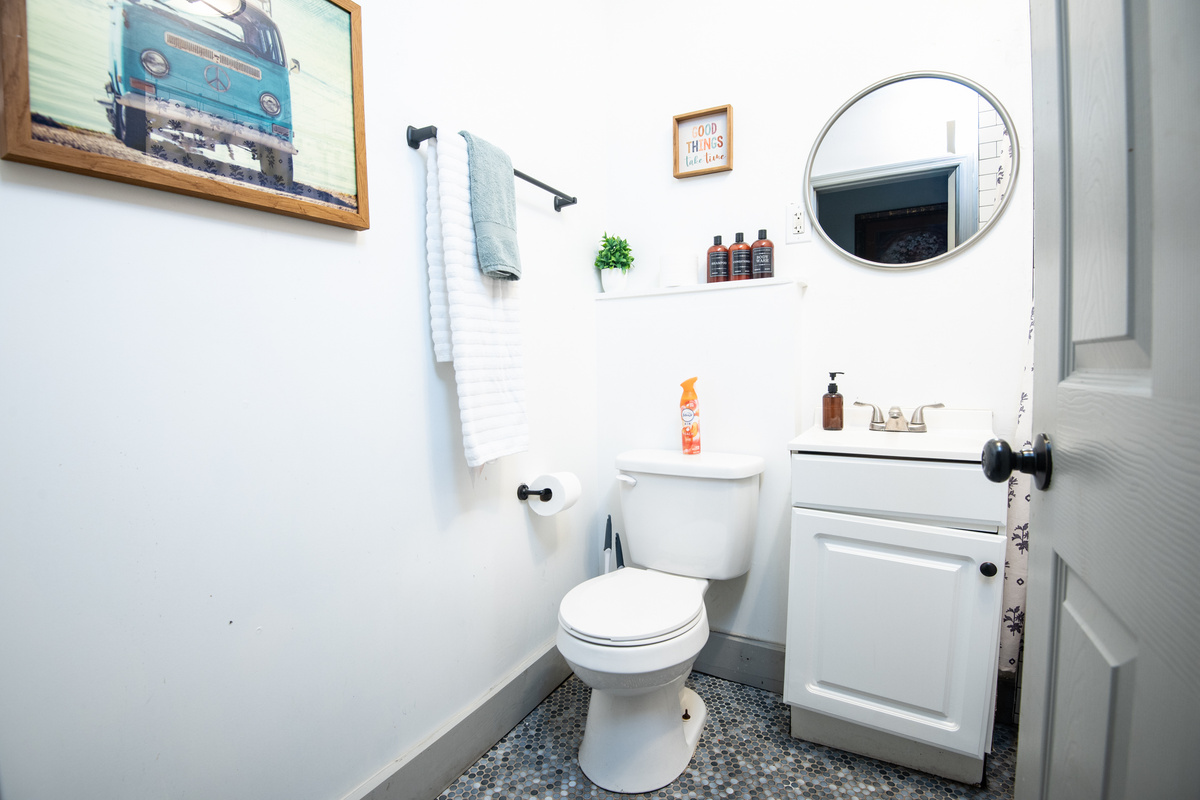Freshen up before a day of exploring or wind down for the evening in this full bathroom. Stocked with fresh towels and the essentials, it's ready whenever you are.