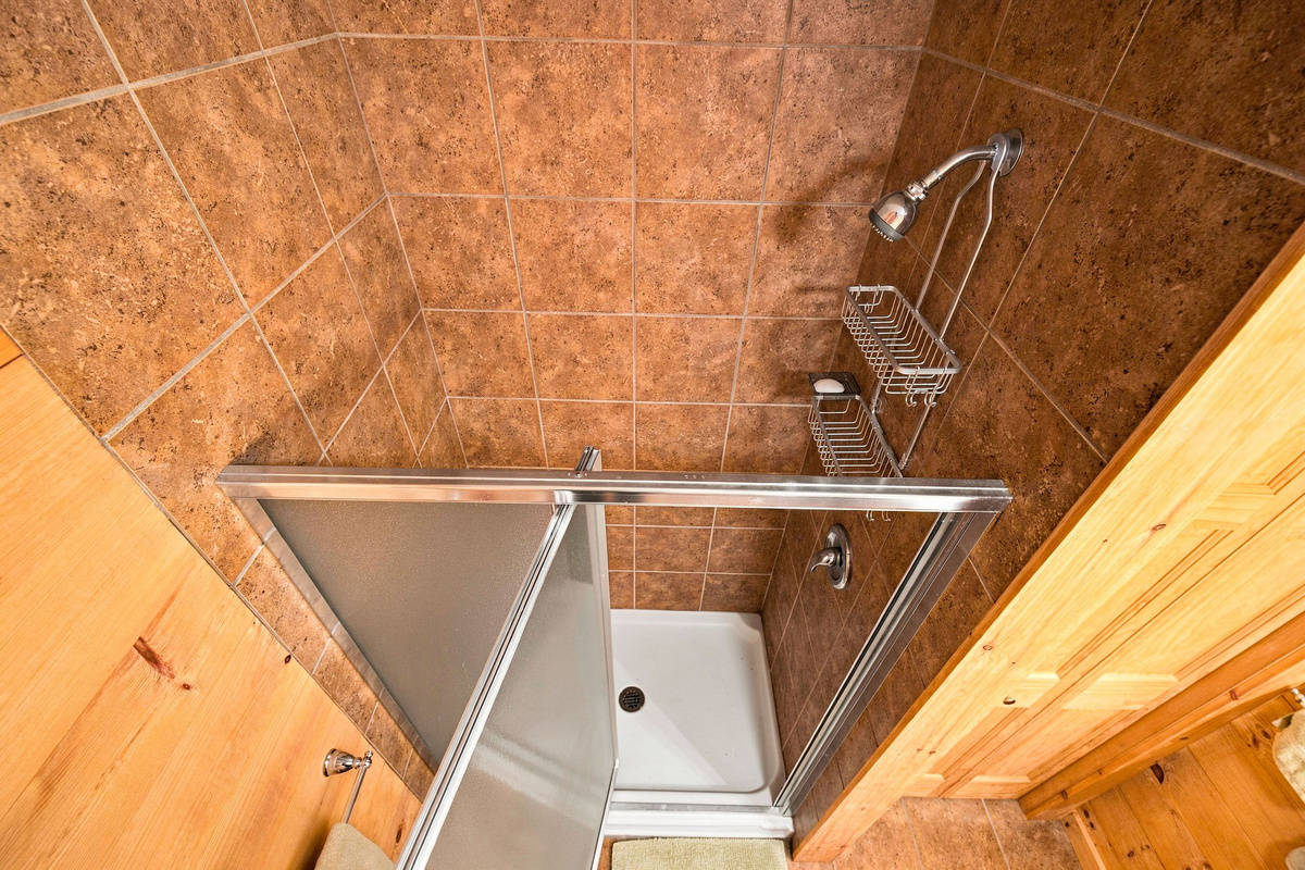 Refresh in the tiled walk-in shower after hiking, skiing, or exploring the Adirondacks.