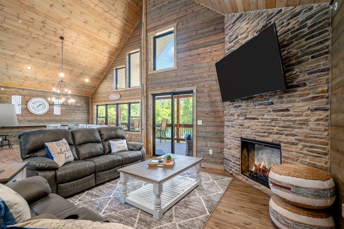 Cozy up to the fireplace in the vaulted living area on the main floor.