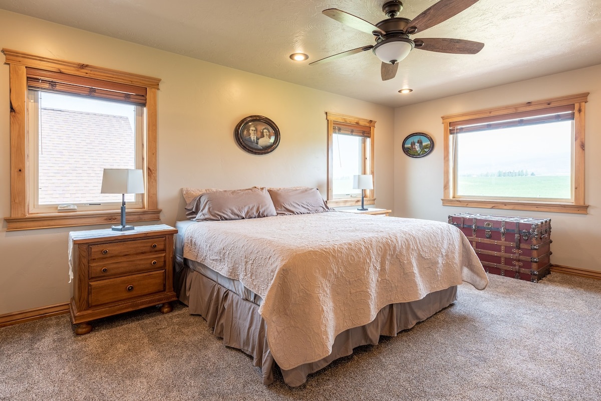 The peaceful 4th bedroom offers a king-size bed for a quiet night's sleep on the 2nd floor.