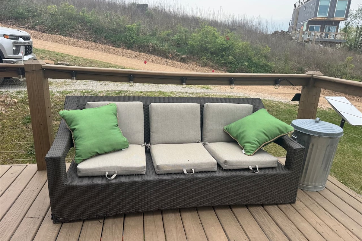 Sunset-view sofa for relaxing after lake adventures.