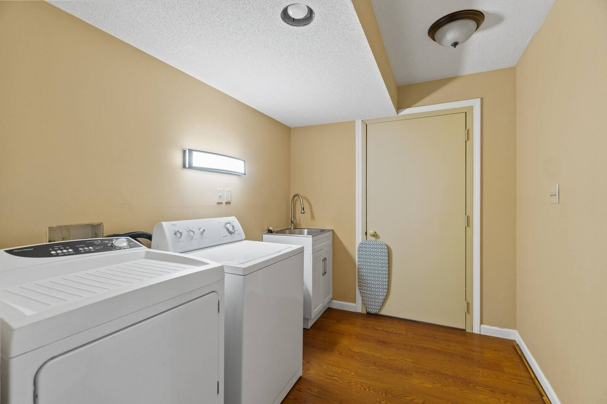 Convenient laundry area equipped with a washer and dryer, making it easy to refresh your clothes during your stay.