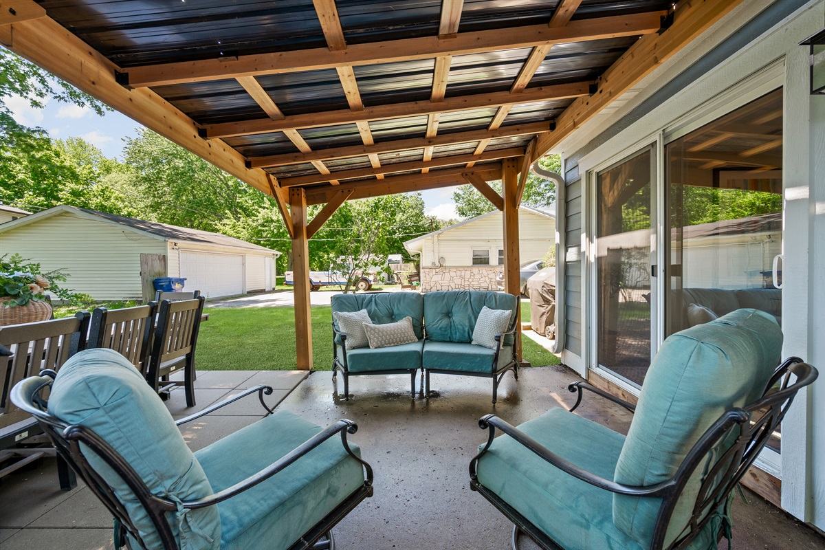 Relax and unwind in the comfortable outdoor seating area, perfect for morning coffee, evening drinks, or spending time together outdoors.