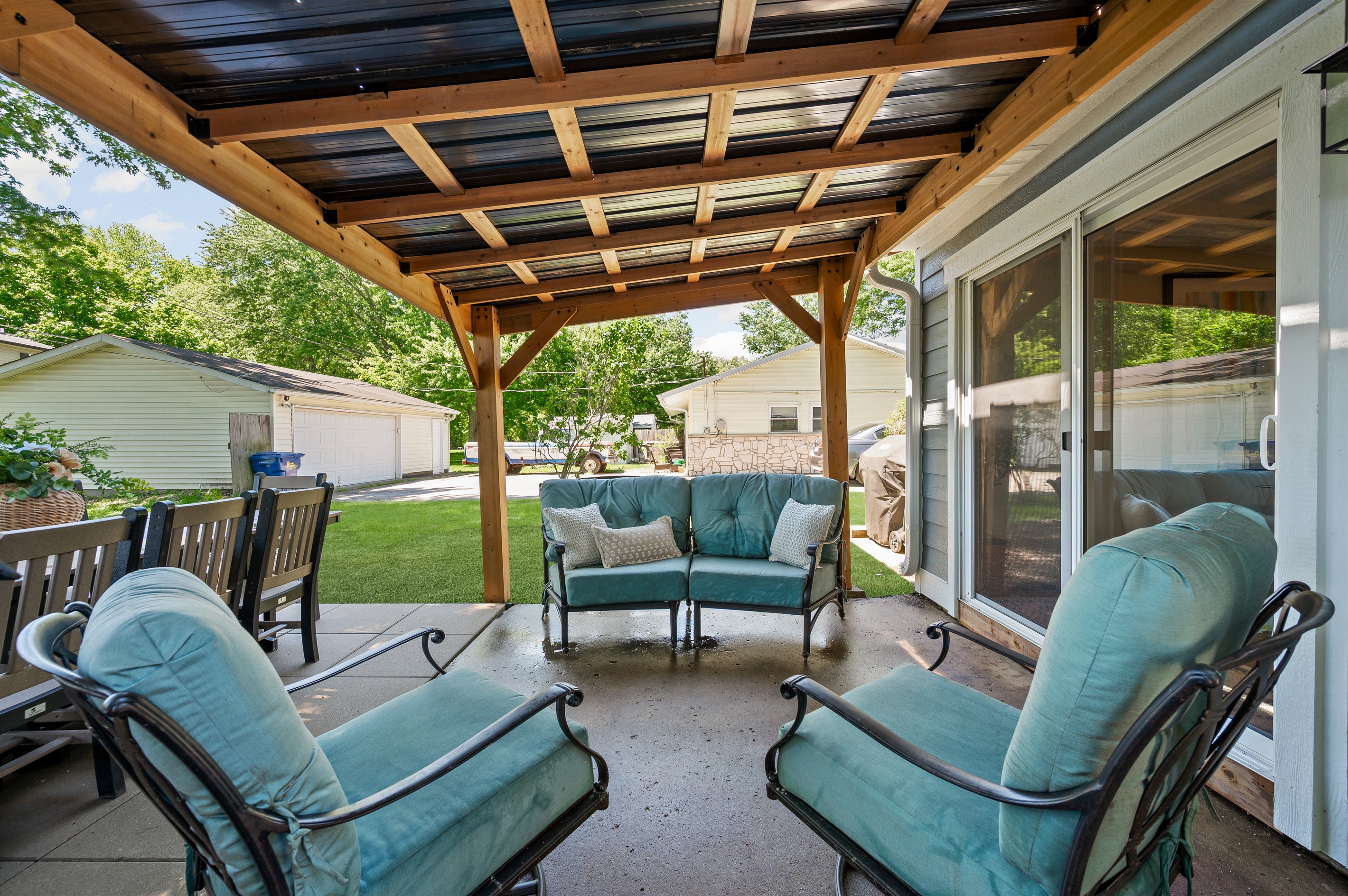 Relax and unwind in the comfortable outdoor seating area, perfect for morning coffee, evening drinks, or spending time together outdoors.