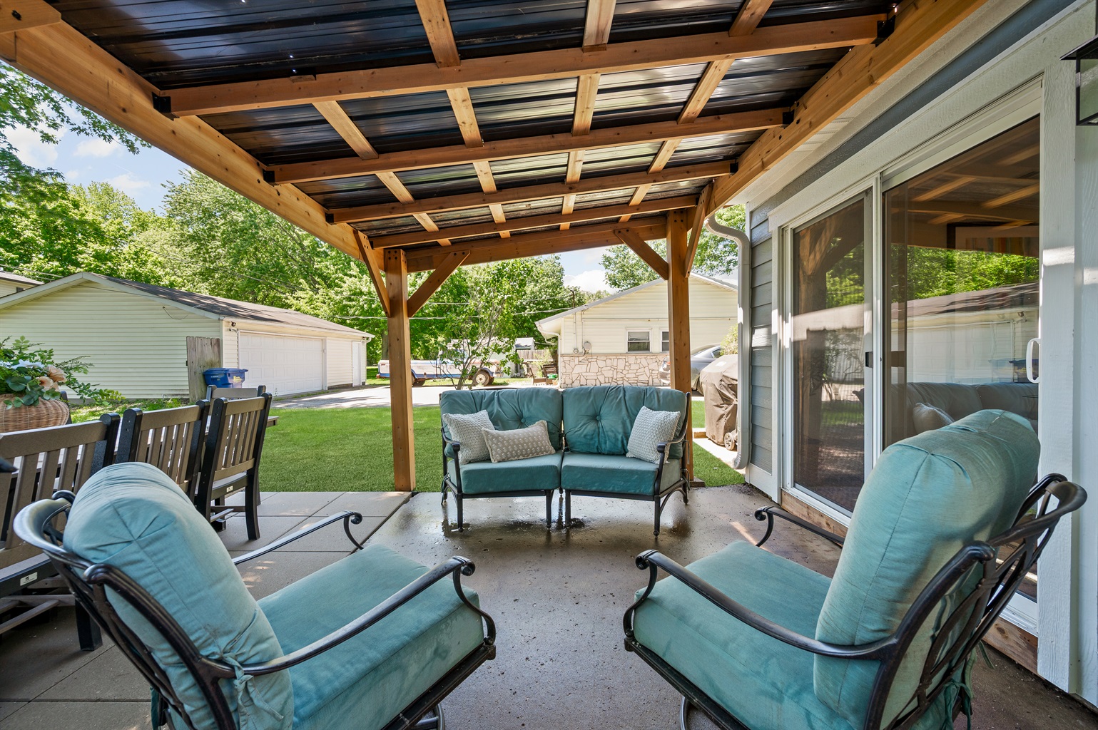 Relax and unwind in the comfortable outdoor seating area, perfect for morning coffee, evening drinks, or spending time together outdoors.