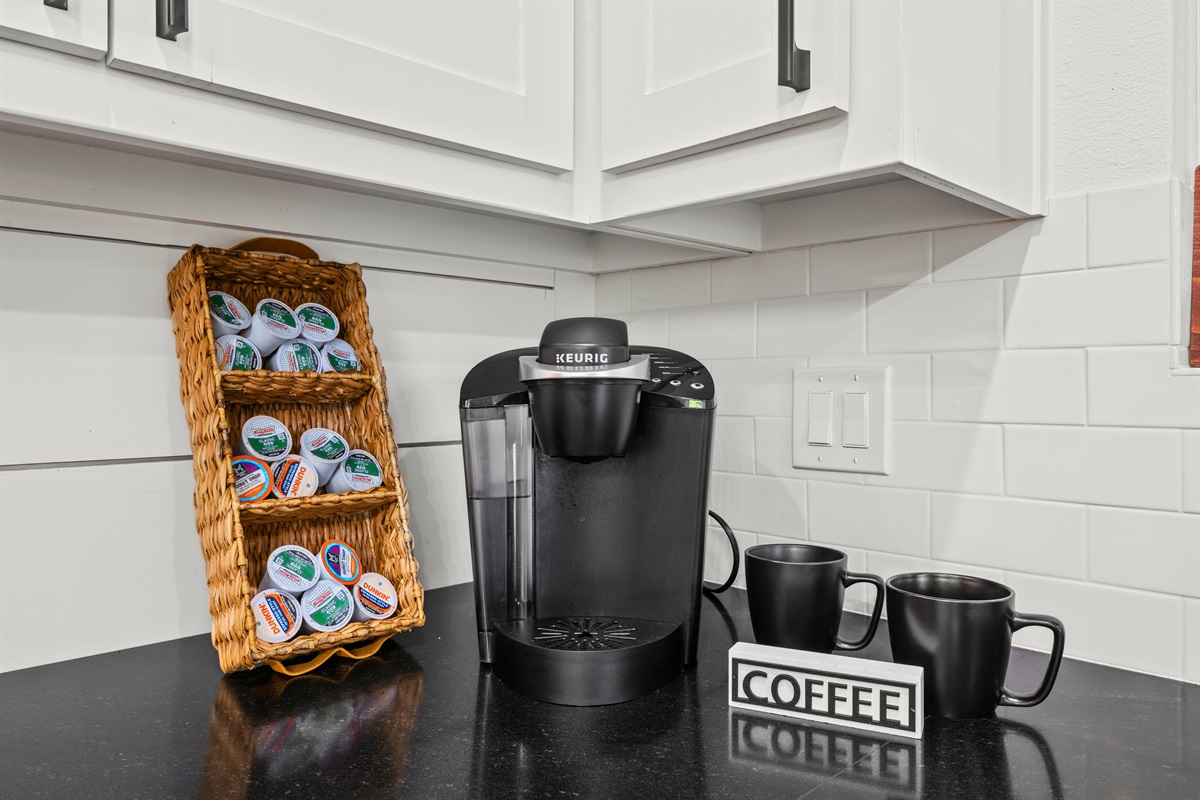 A dedicated coffee station adds a thoughtful touch that makes slow mornings feel especially inviting.