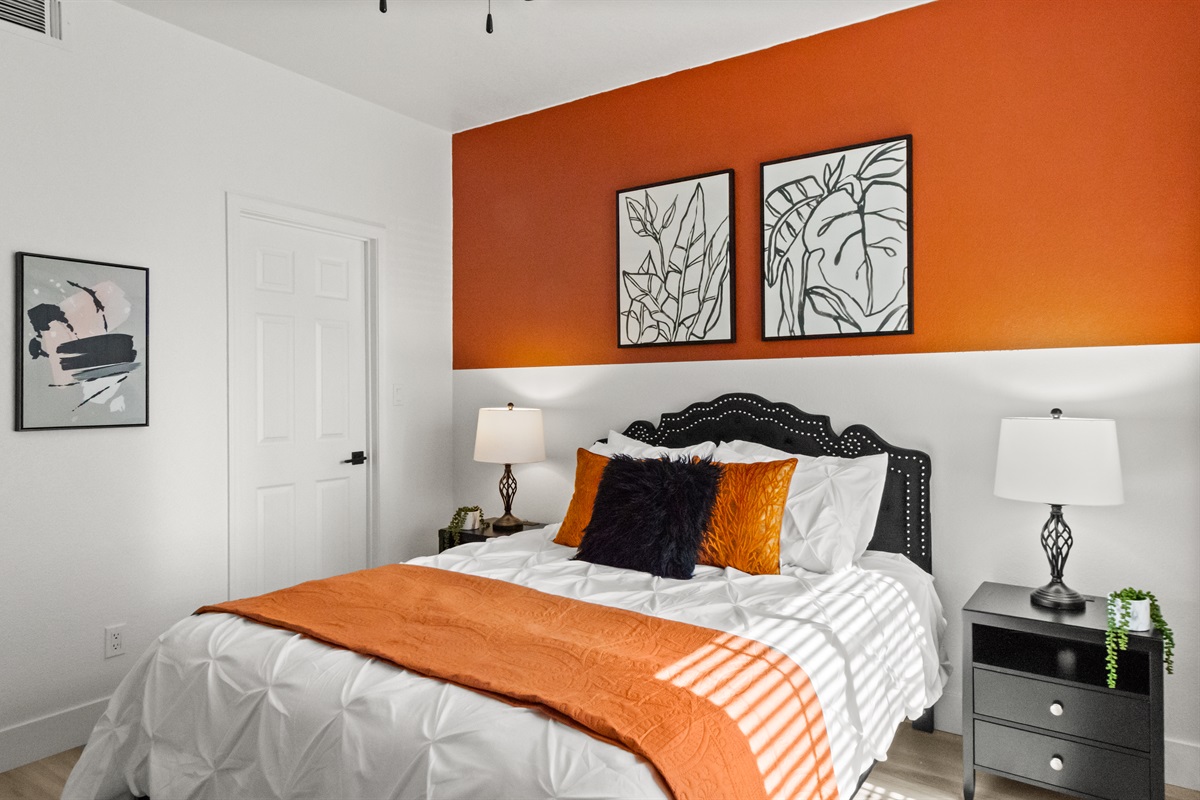 Designed for comfort and convenience, this cozy bedroom offers a comfortable bed, quality bedding, and a quiet retreat for vacation or business travelers.