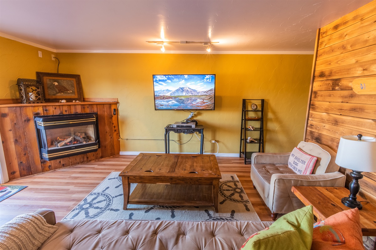 A large cozy gas fireplace at the end of the day