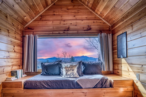 Huge window & amazing mountain views from one of the 2 upstairs bedrooms, both with a sleeping nook with a twin bed (and both also have a king bed and private bathrooms).