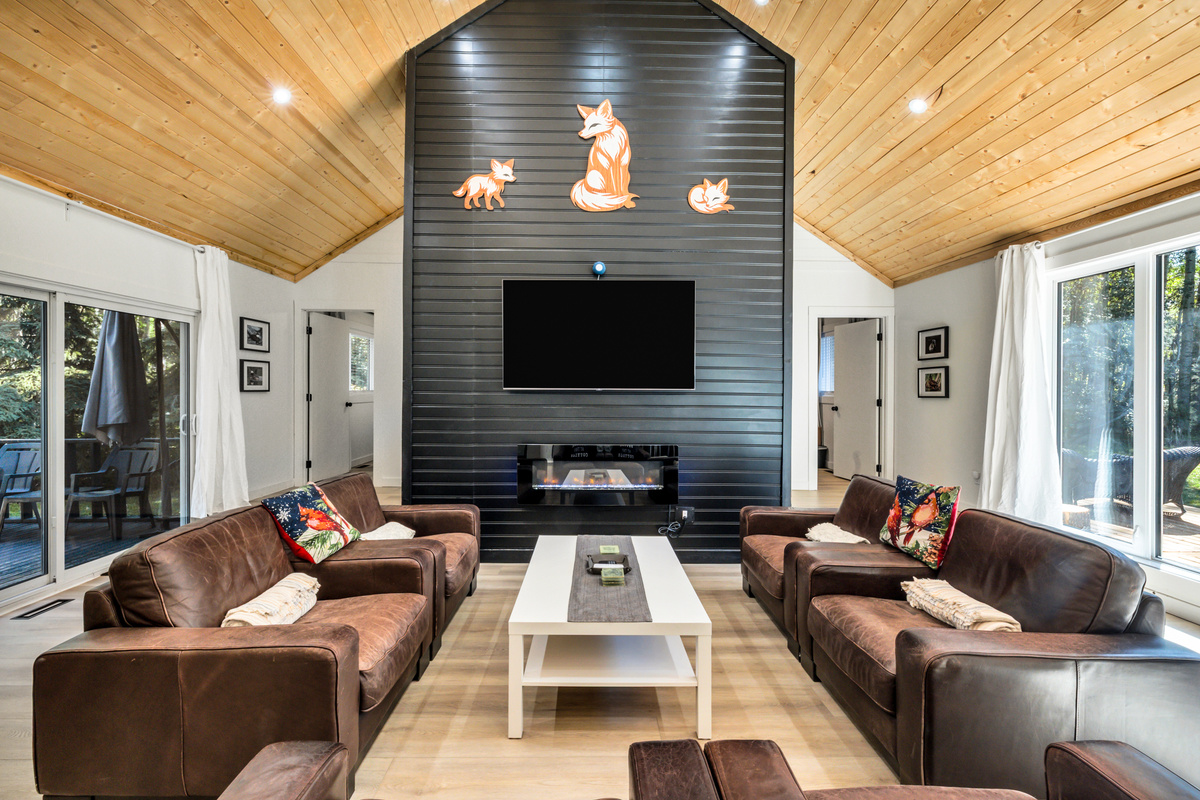 Sink into the comfortable living room, warm up by the fireplace, and unwind together after a day at the lake or exploring the area.