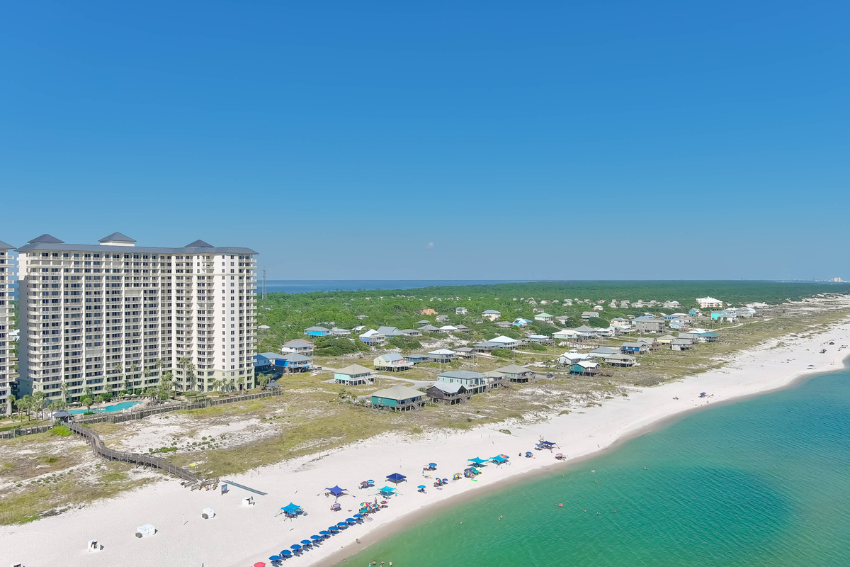 Find peace and tranquility in this sweeping view of sand and sea.  A visual escape to the calming shores.