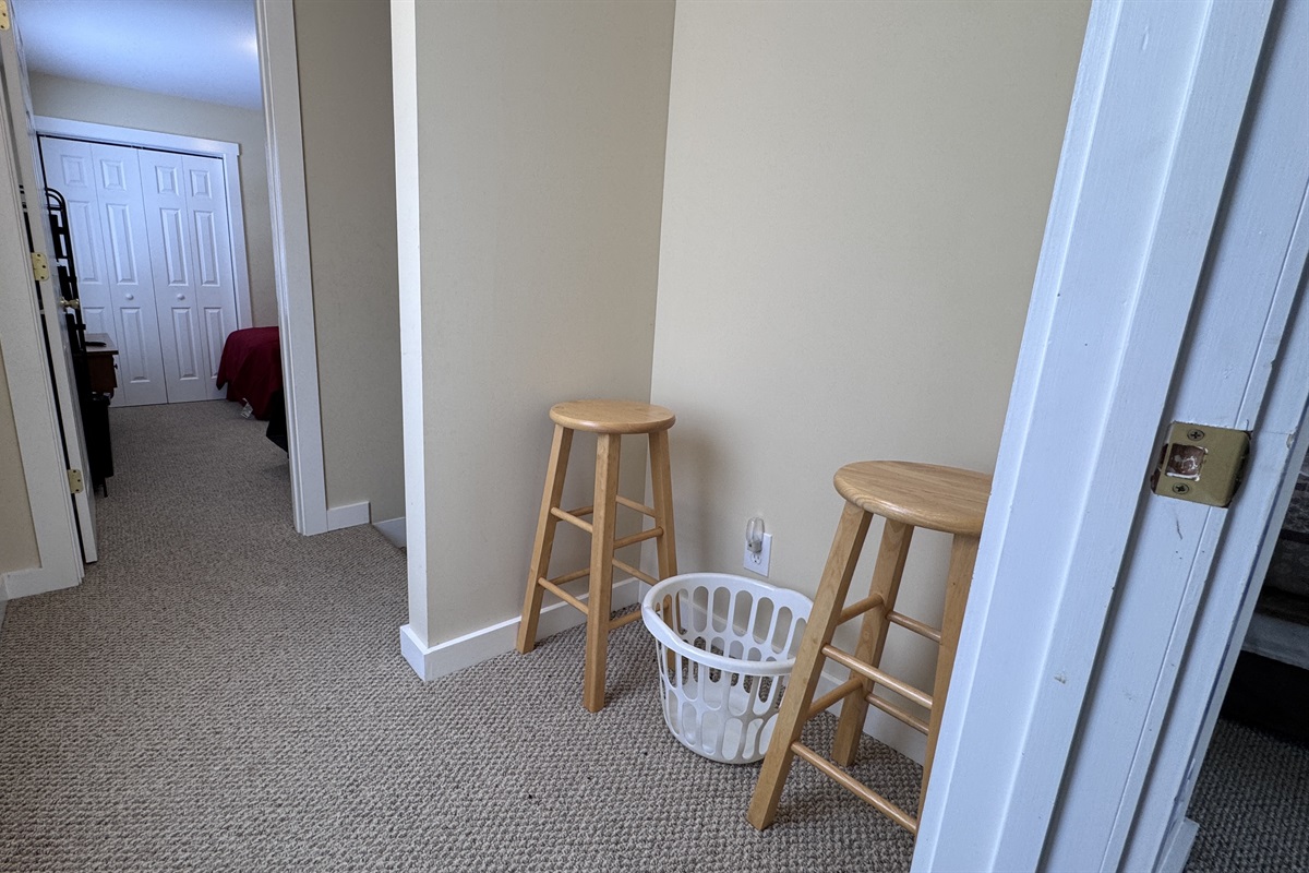 Hallway between Primary Bedroom and the 3rd bedroom with the twin beds