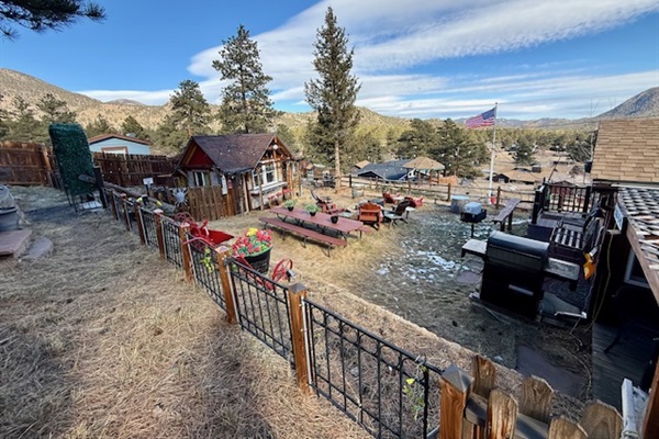 A private outdoor bar with three seats and a TV inside — ideal for slow mornings or easy evenings.