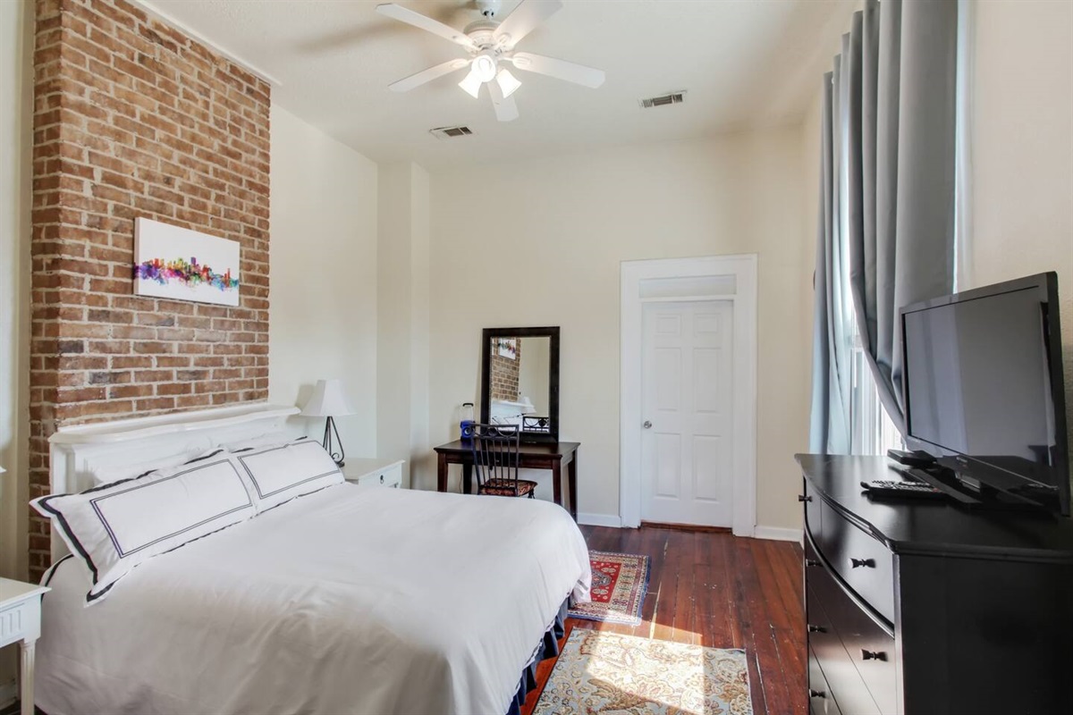 Bedroom 3. Upstairs. 1 king bed, cable tv. Central HVAC. Memory foam gel mattress - our guests' favorite!