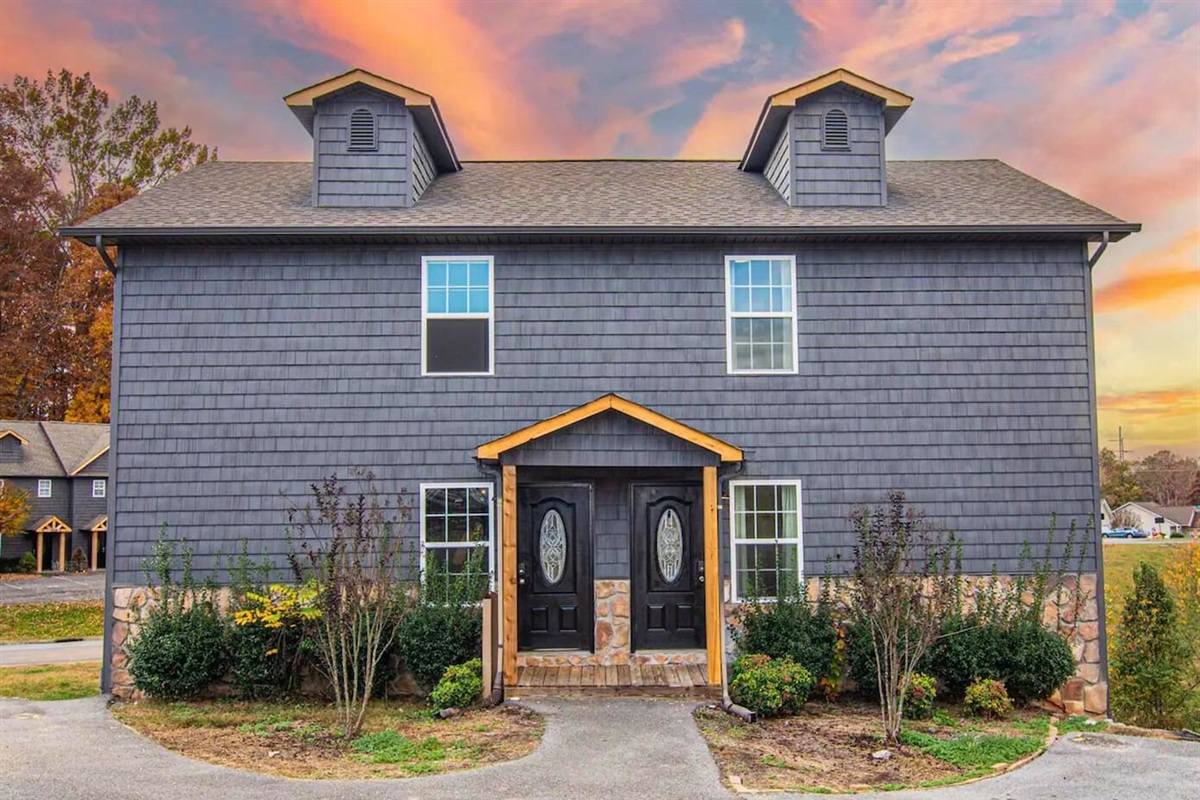 Arrive at a welcoming facade with rustic touches that promise a stay full of charm and relaxation at Willow Trace.