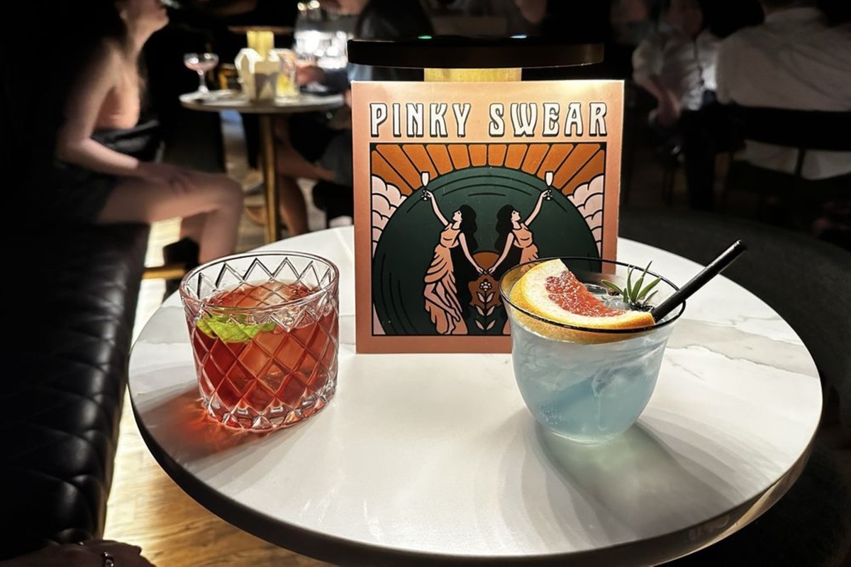 For a chic night out, head to Pinky Swear for craft cocktails, moody ambiance, and elevated girls trip vibes in Northwest Arkansas.