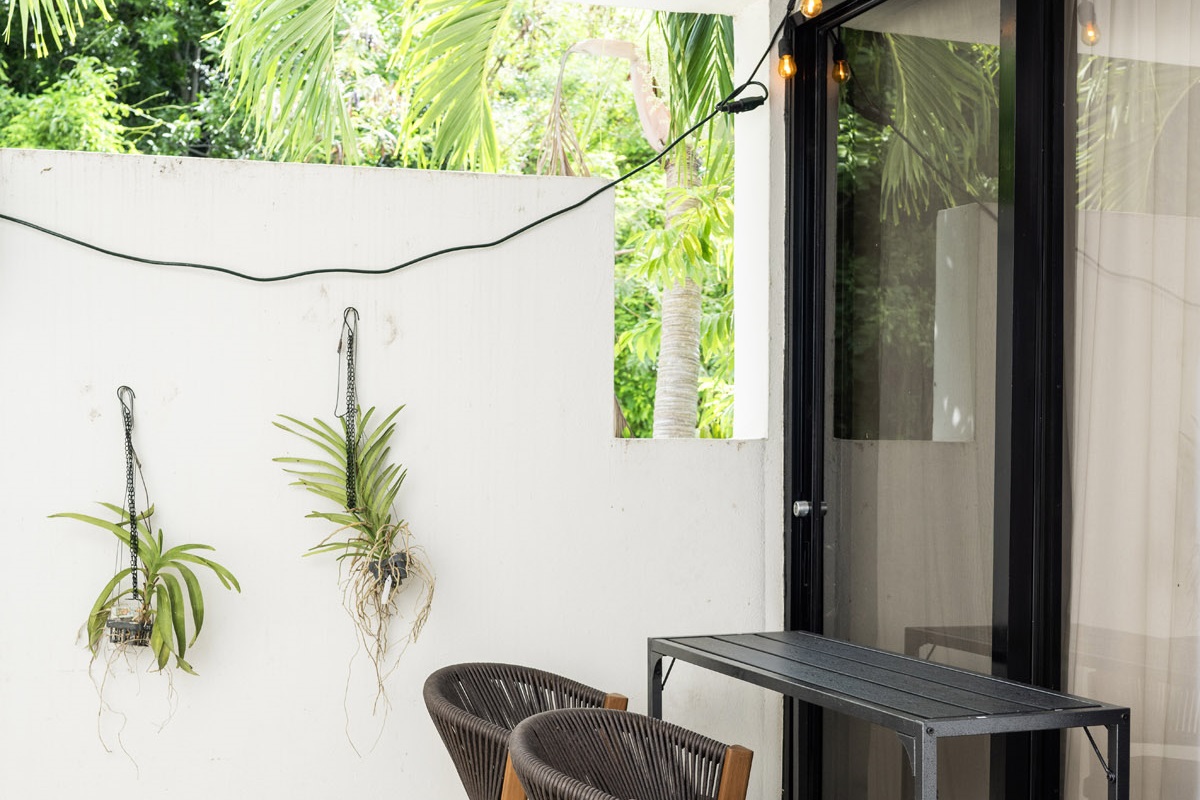 Evenings come alive with twinkling lights and lush surroundings.