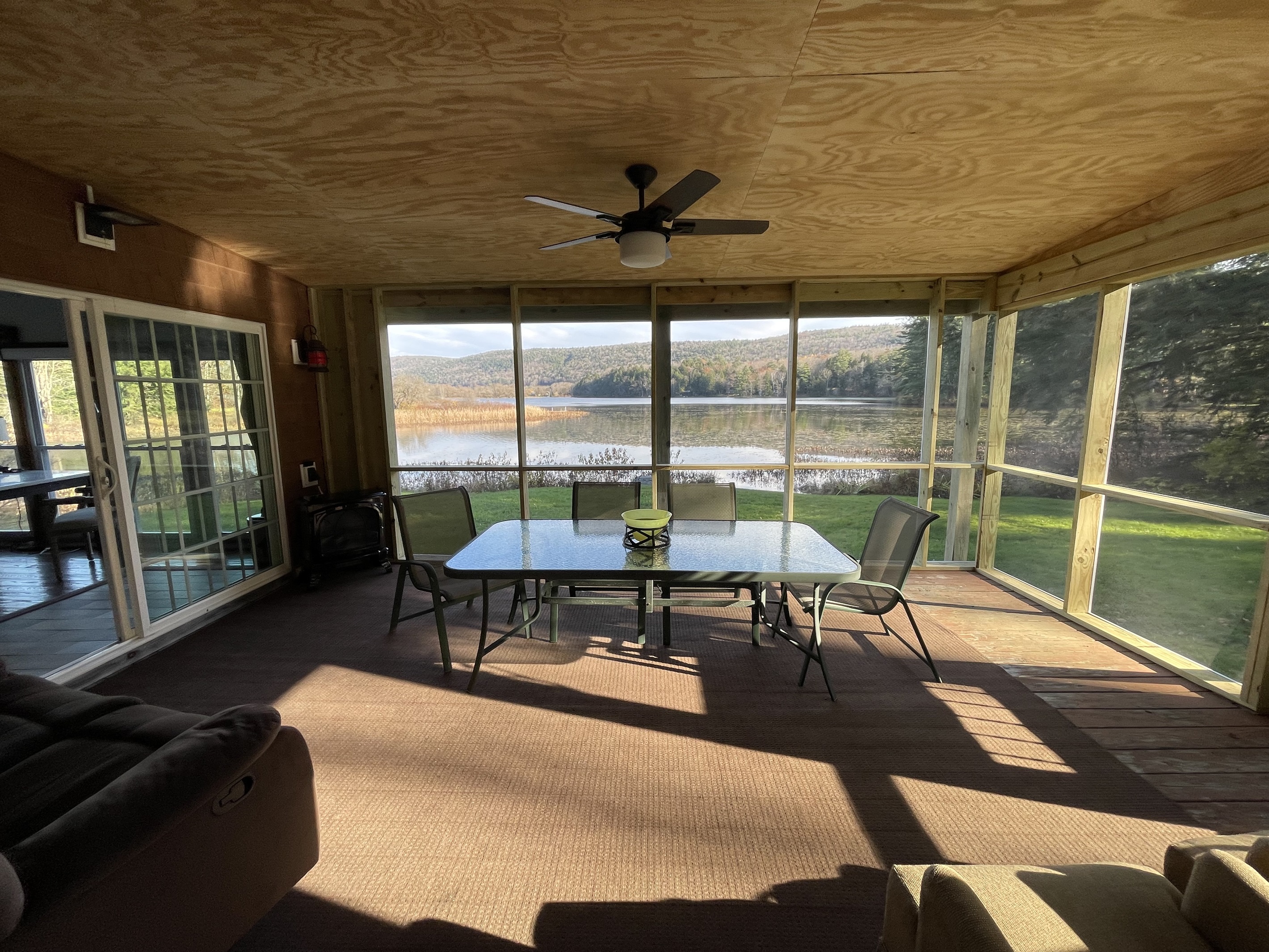 Nature's Hidden Treasure dining on the screened in porch.