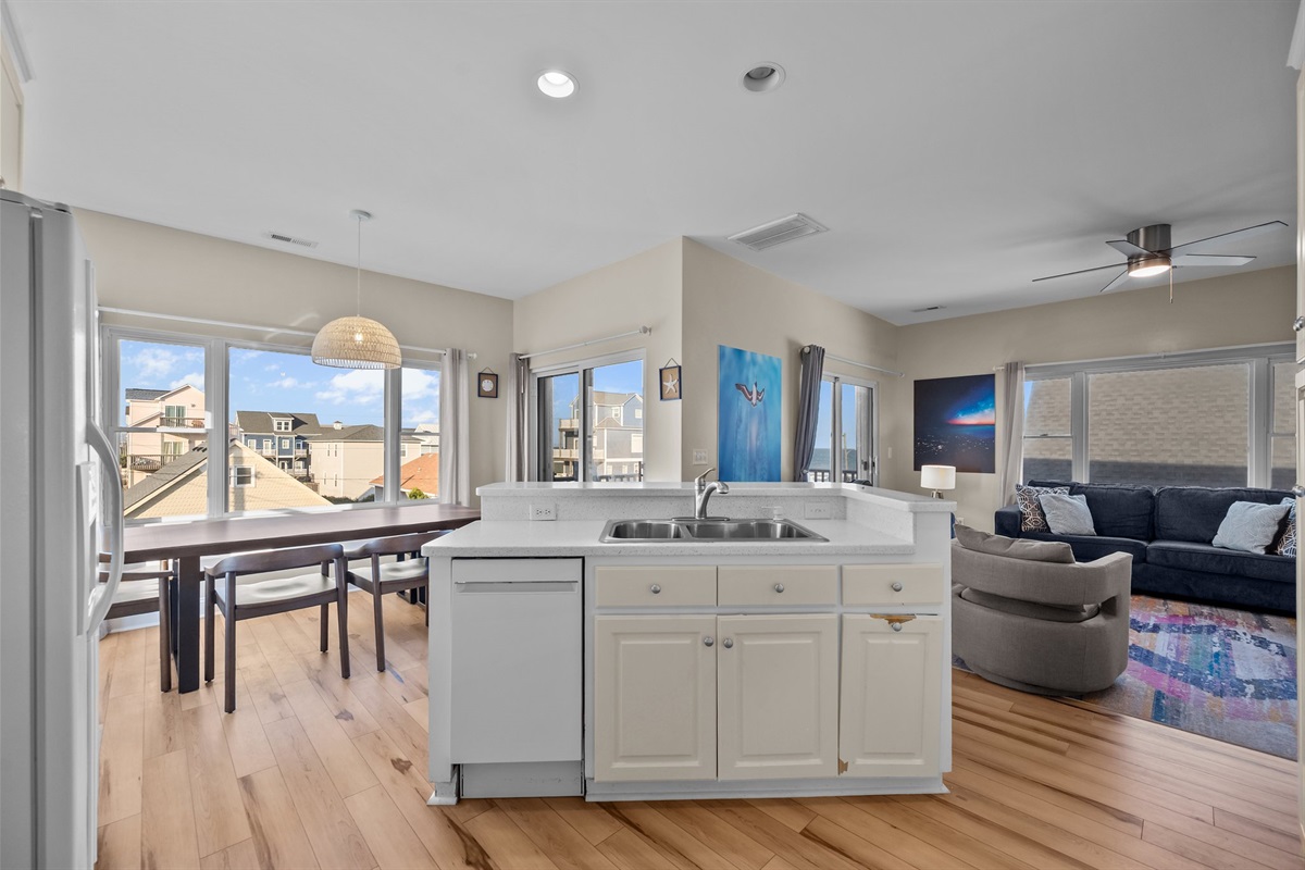 Spacious open-concept kitchen that flows seamlessly into the living and dining areas.