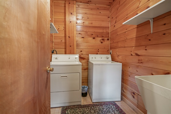 Washer and dryer in basement laundry room.