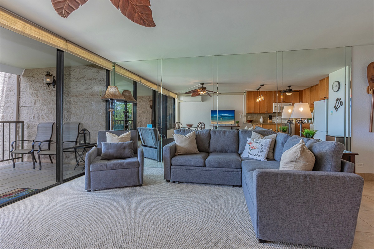 Spacious living room with brand new furniture and sofa bed