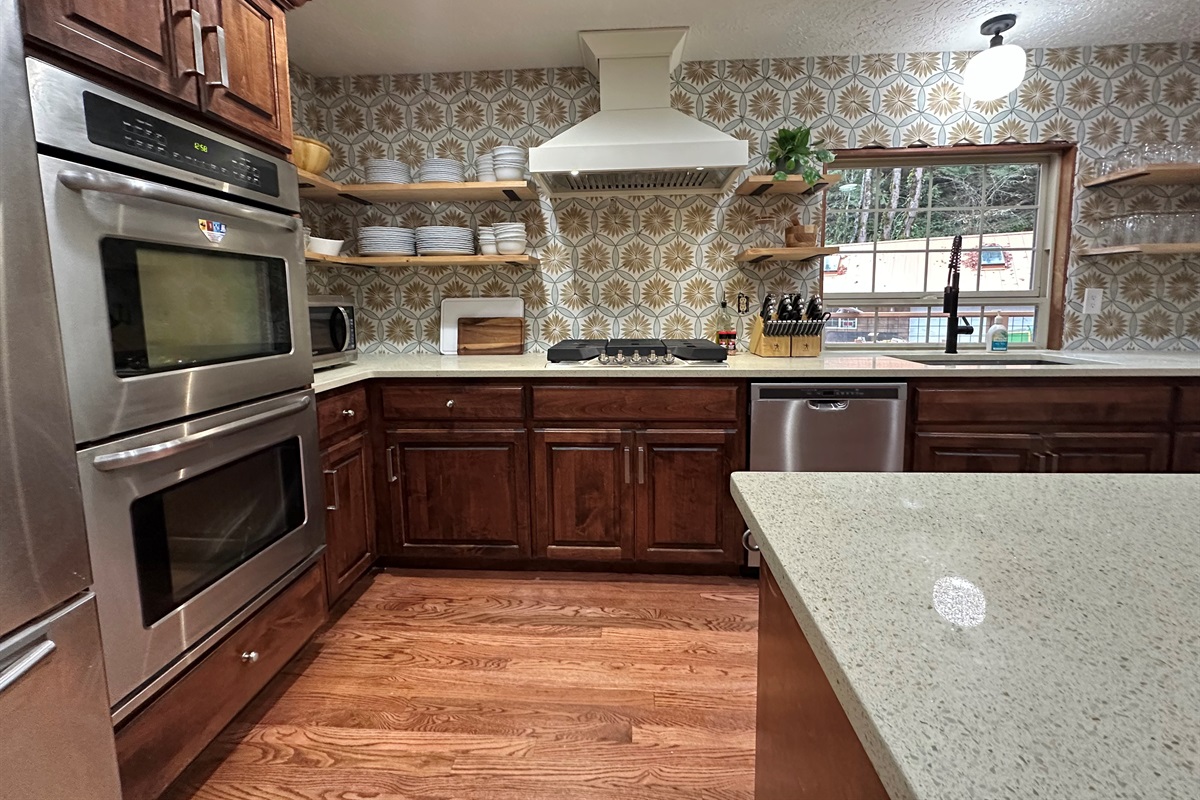 A large gas range (a second 2 burner portable cooktop), double ovens and all the cookware and bakeware you'll need to make delicious meals for even the largest groups.