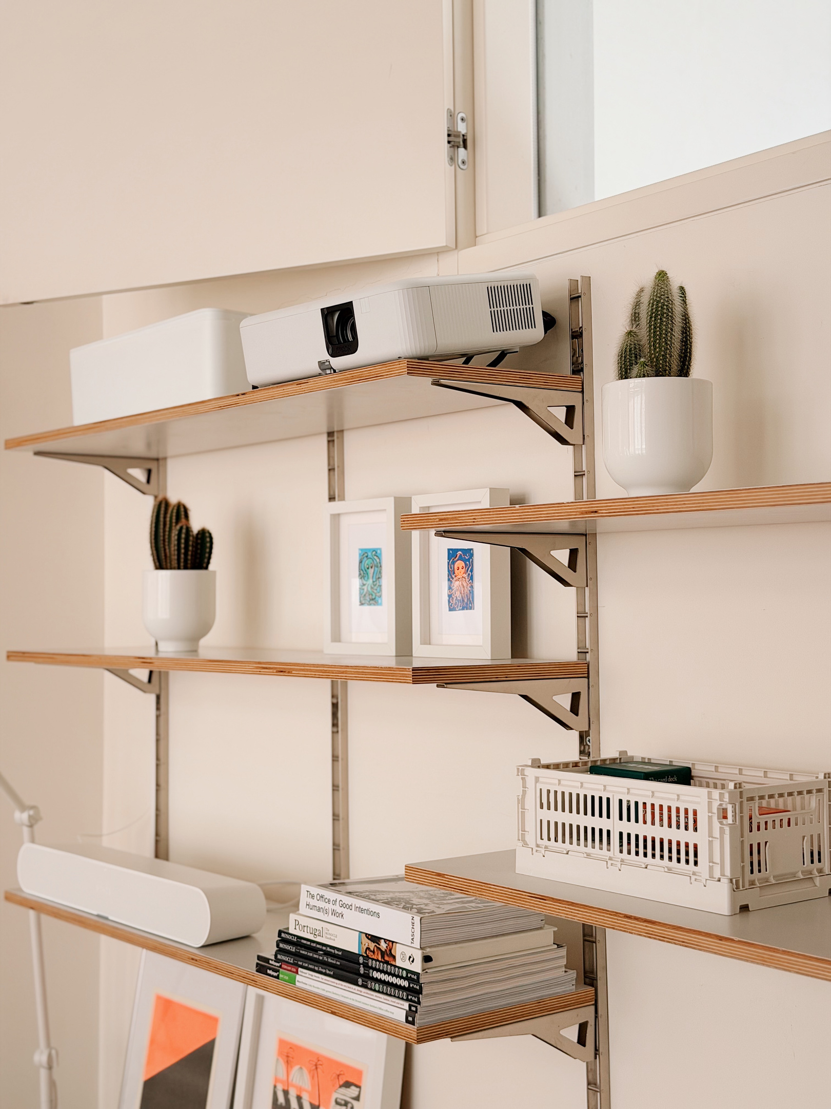Shelving with fixed projector.