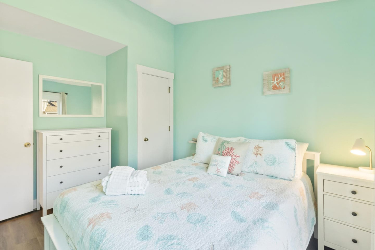 Sleep soundly in the comfortable main-level queen bedroom &mdash; clean, calm, and a great place to fully recharge.	