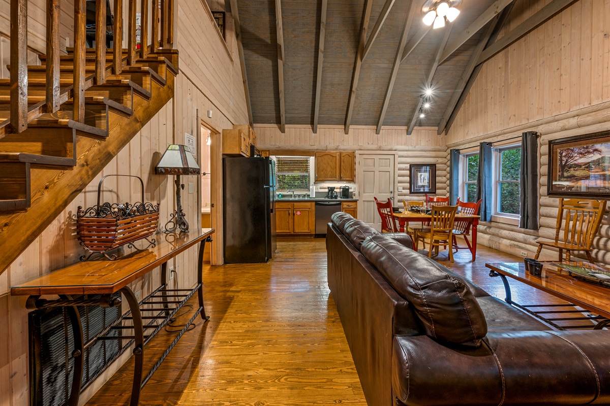 Rustic charm: open living, dining, and kitchen for your mountain escape.