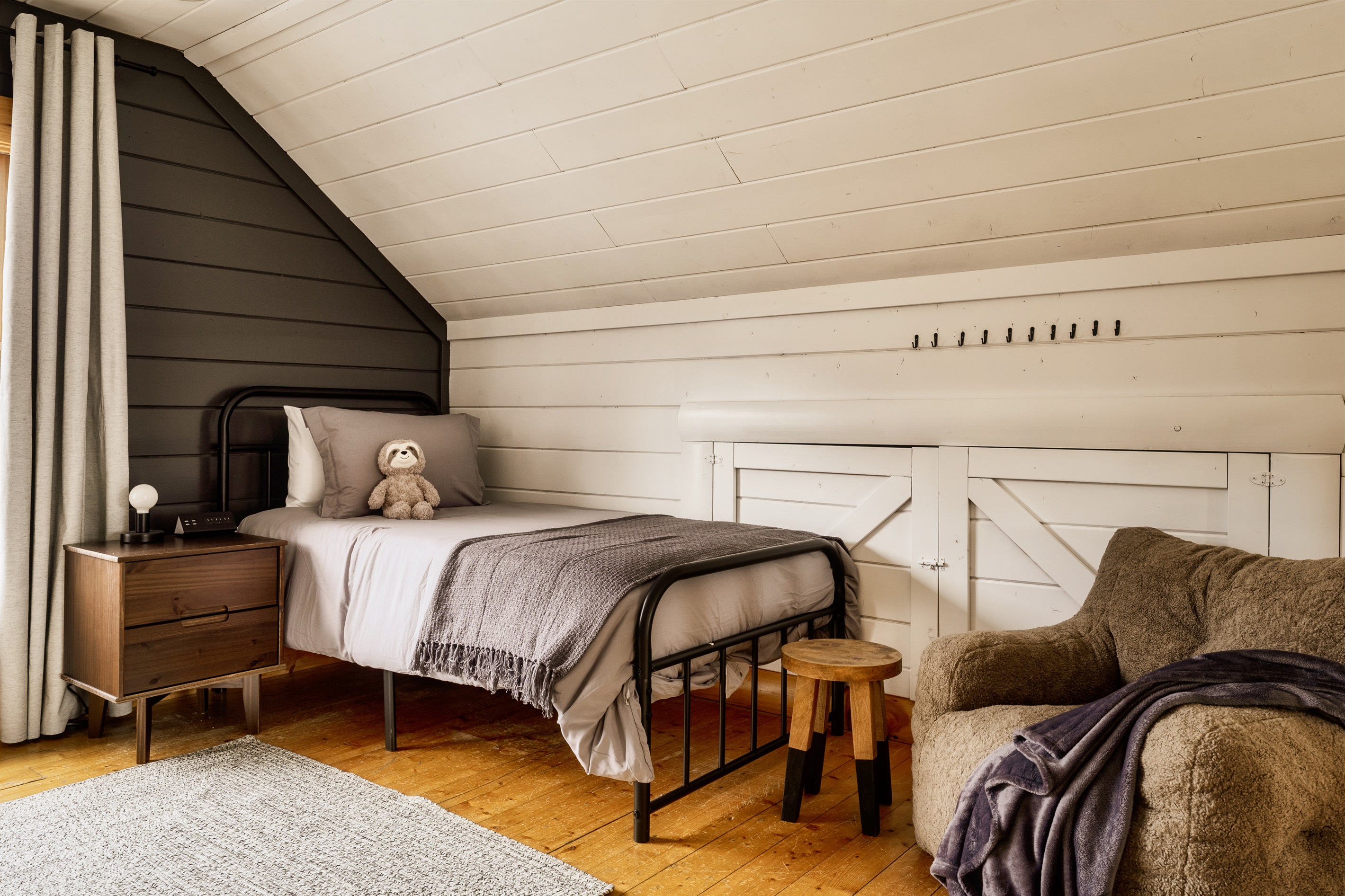 Cozy corners and double the dreams! Embracing the snug charm of twin beds tucked away in the attic.