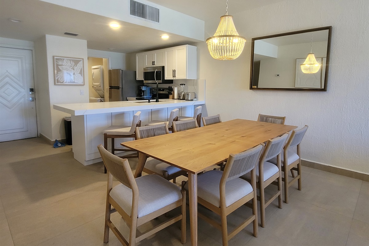 Dining room with extended table with seating for everyone. Giving a modern boho vibe.