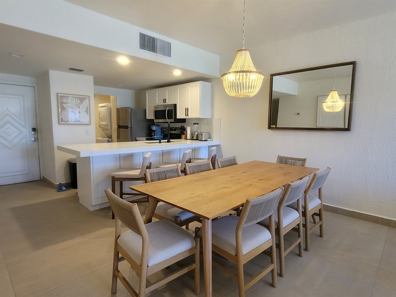 Dining room with extended table with seating for everyone. Giving a modern boho vibe.