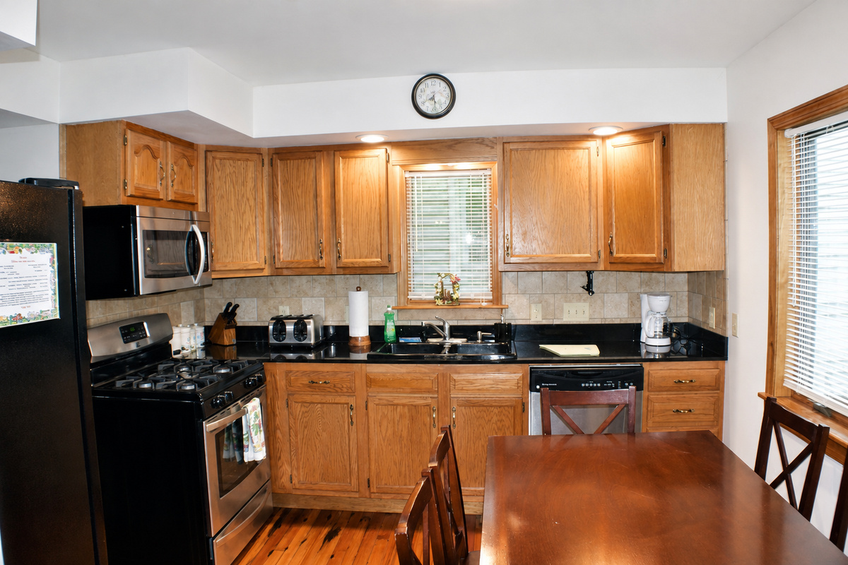 Modern Kitchen with Granite countertops and stainless appliances