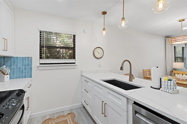 Fully Equipped Modern Kitchen: Prepare your favorite meals in our brand new fully remodeled and fully equipped kitchen with stainless steel appliances and ample counter space.