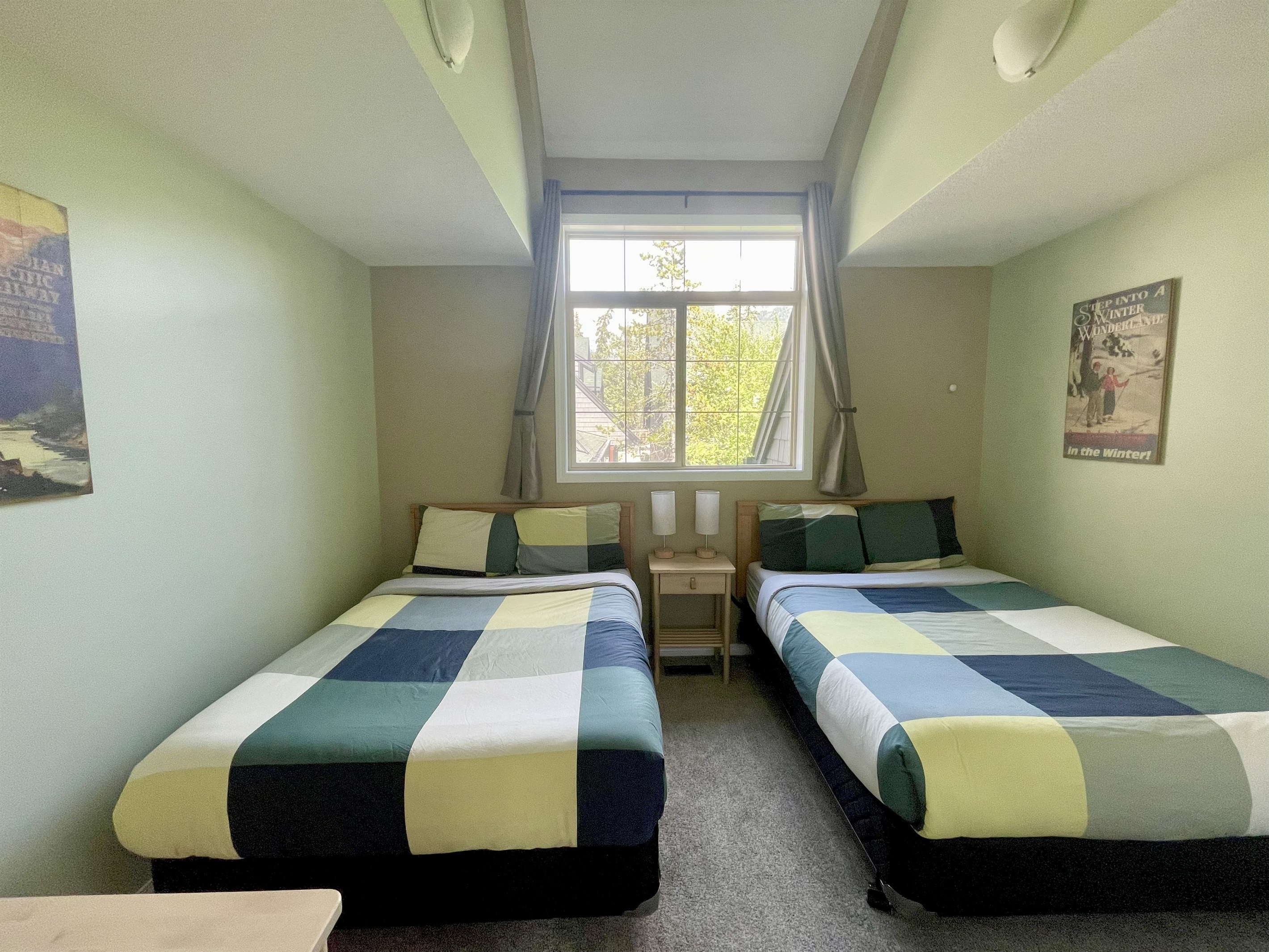 2nd bedroom.  Two double beds.  Adjacent bathroom in hallway.  Located on 2nd floor.