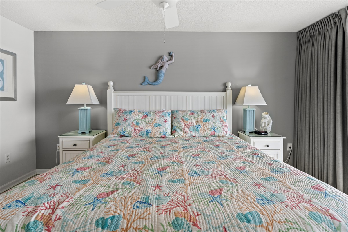 Main Bedroom with King and balcony access