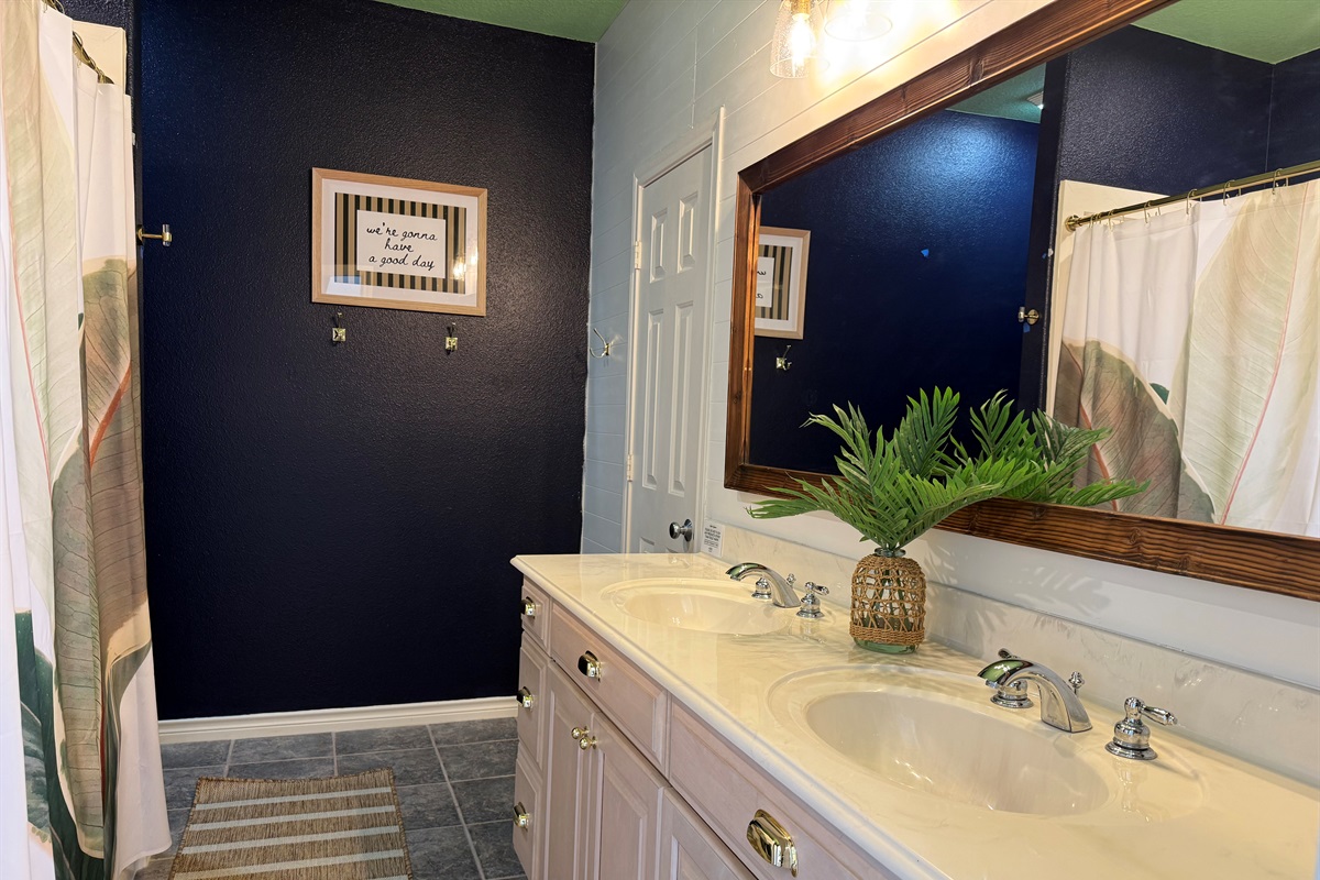 Double vanities with tub shower combination, walk in closet. And the kid tent play space! 