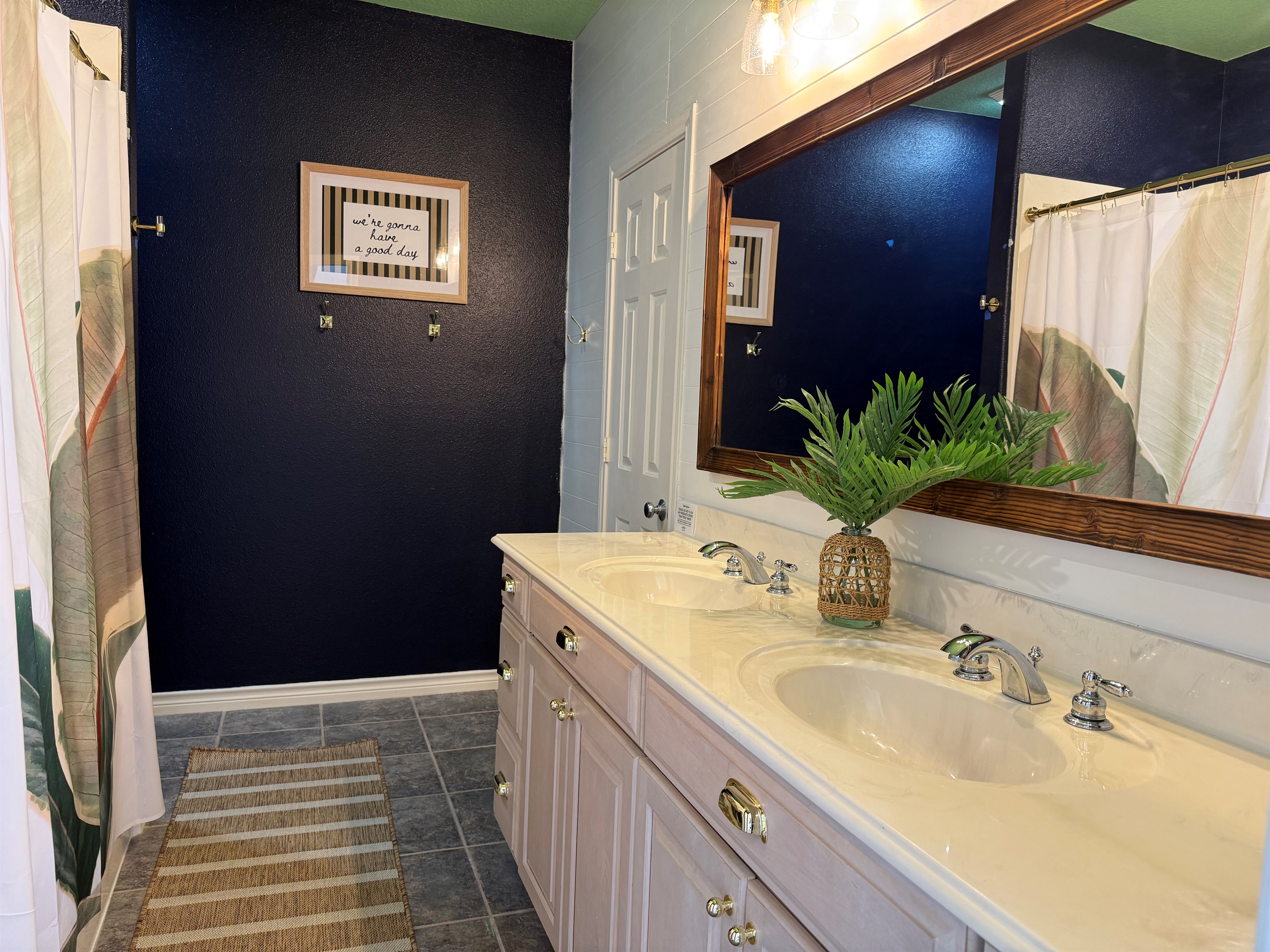 Double vanities with tub shower combination, walk in closet. And the kid tent play space! 