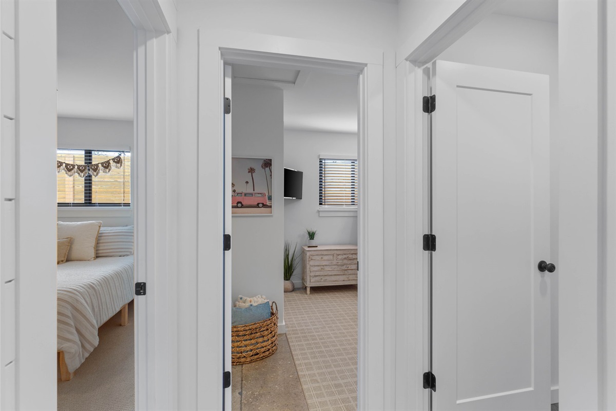 Hallway separating the two bedrooms and the hallway bathroom