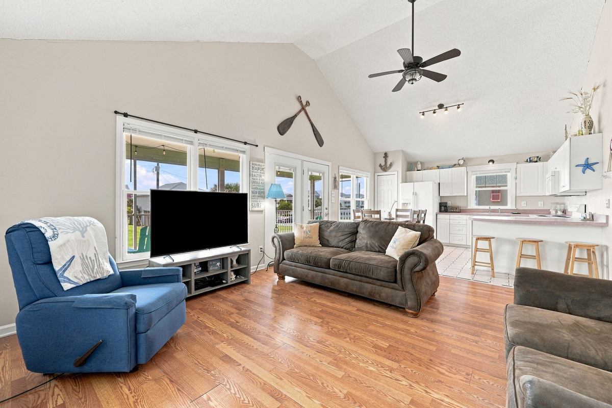 Stretch out in the spacious open-concept living area where everyone has room to relax after a fun-filled day at the beach