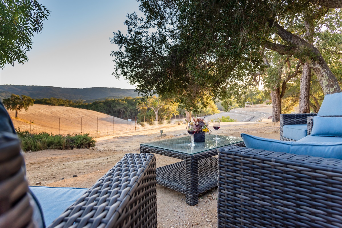 A serene outdoor lounge perfect for sunset drinks and golden hour views.