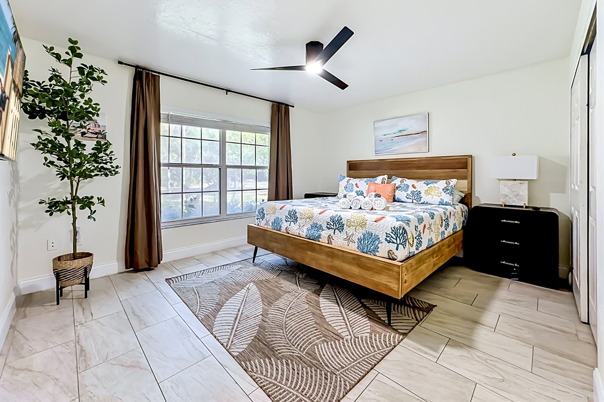 Our 4th bedroom, with a King bed and a smart TV.