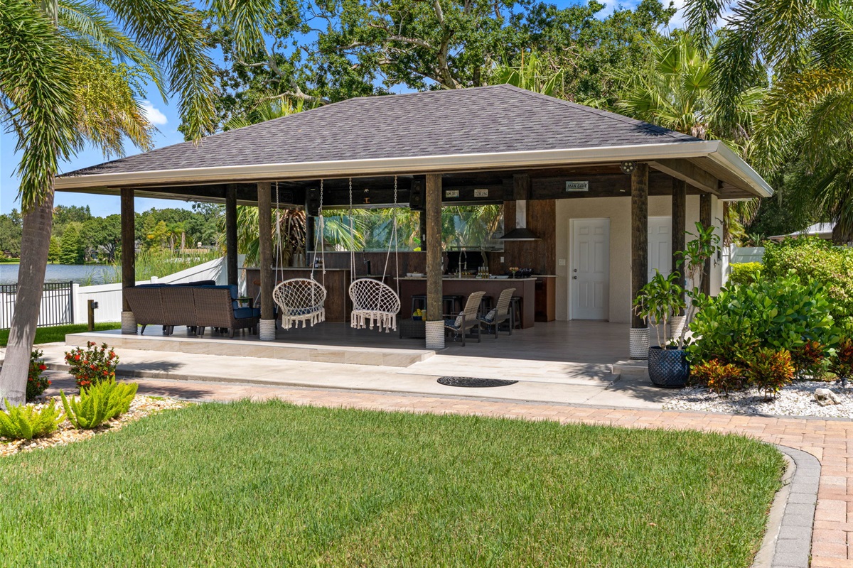 Step outside into your very own private lakeside retreat, where serene views and thoughtfully designed amenities come together to create the ultimate outdoor living experience.