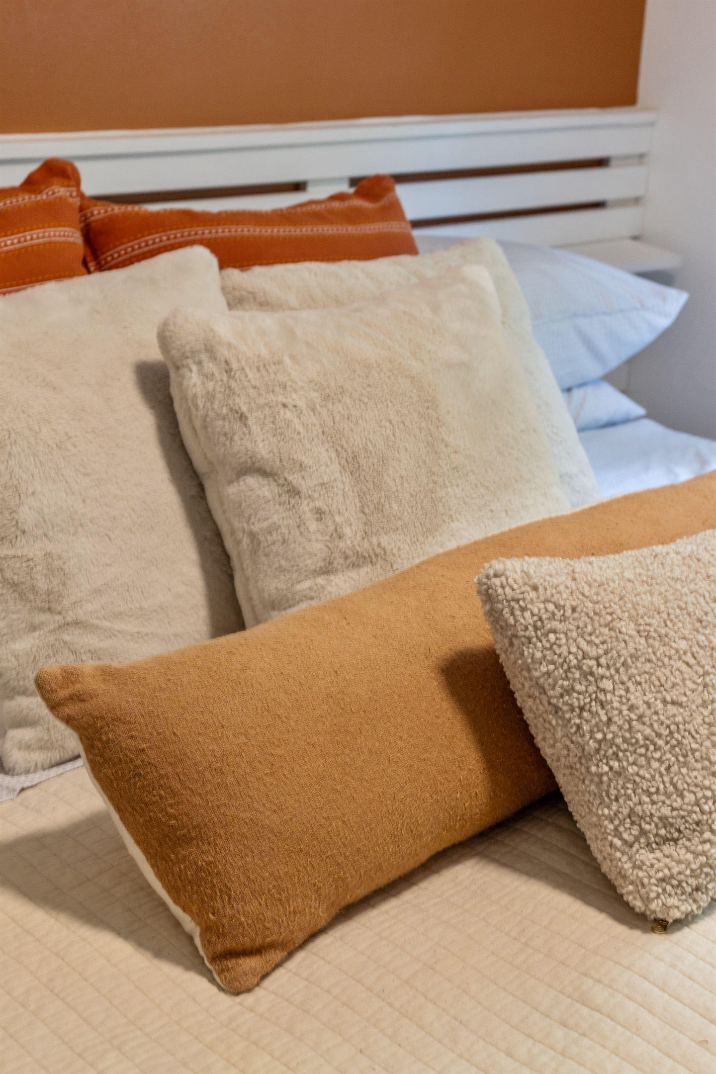 Wrapped in soft linens and plenty of pillows, this king bed is made for relaxation.