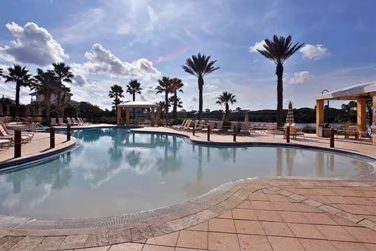 Relax poolside in true resort style 🌴
Spacious lounging areas, palm-lined views, and a serene setting make this Cinnamon Beach pool a favorite for soaking up the Florida sun.

