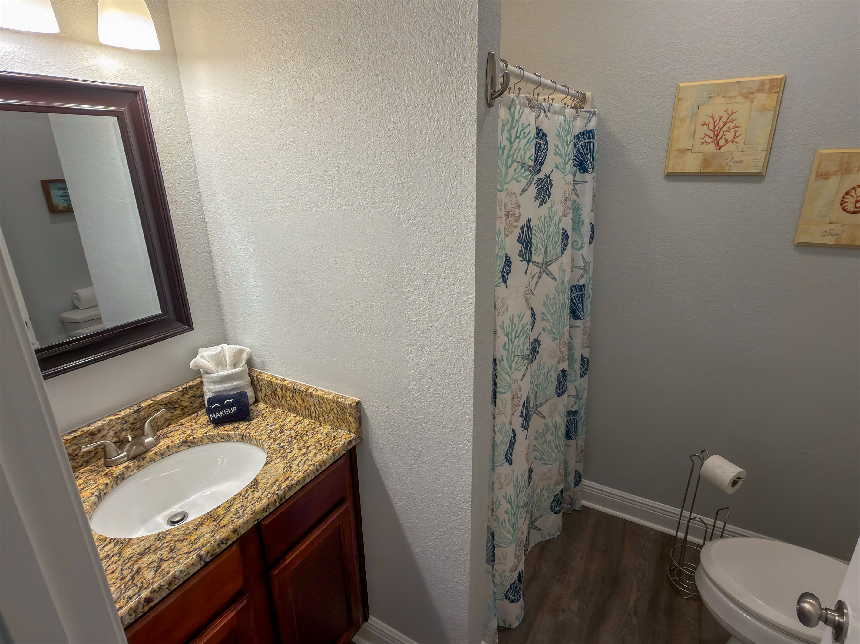 Ensuite Bathroom 5 offers a spacious vanity area and a walk-in shower, ideal for both quick refreshes and relaxing evenings in.