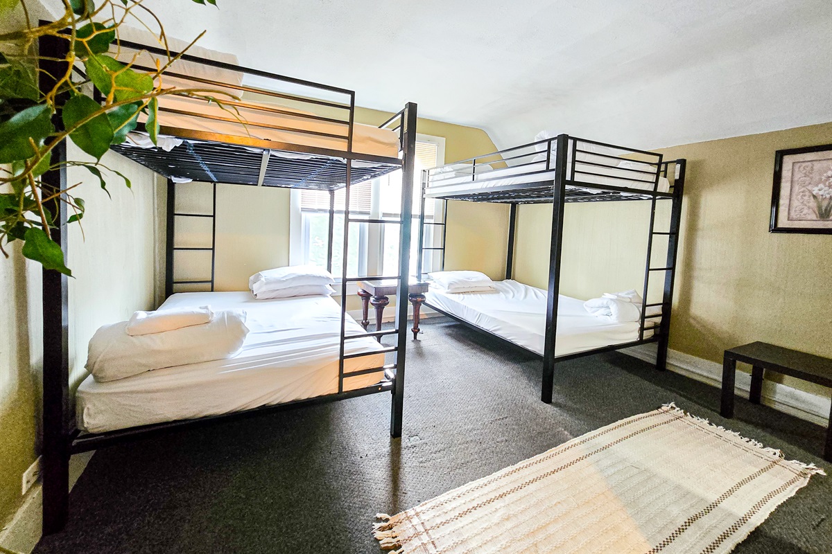 Two bunk beds with queen size mattresses