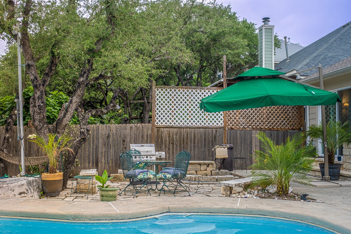 Welcome to your own private Backyard Oasis. Spa jets in pool bench seats & separate hot tub. Natural gas grill, oversized hammock for two, heated pool. Could it get any better?! Come, dive in ️